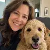 Marianne K. with her dog, verified customer